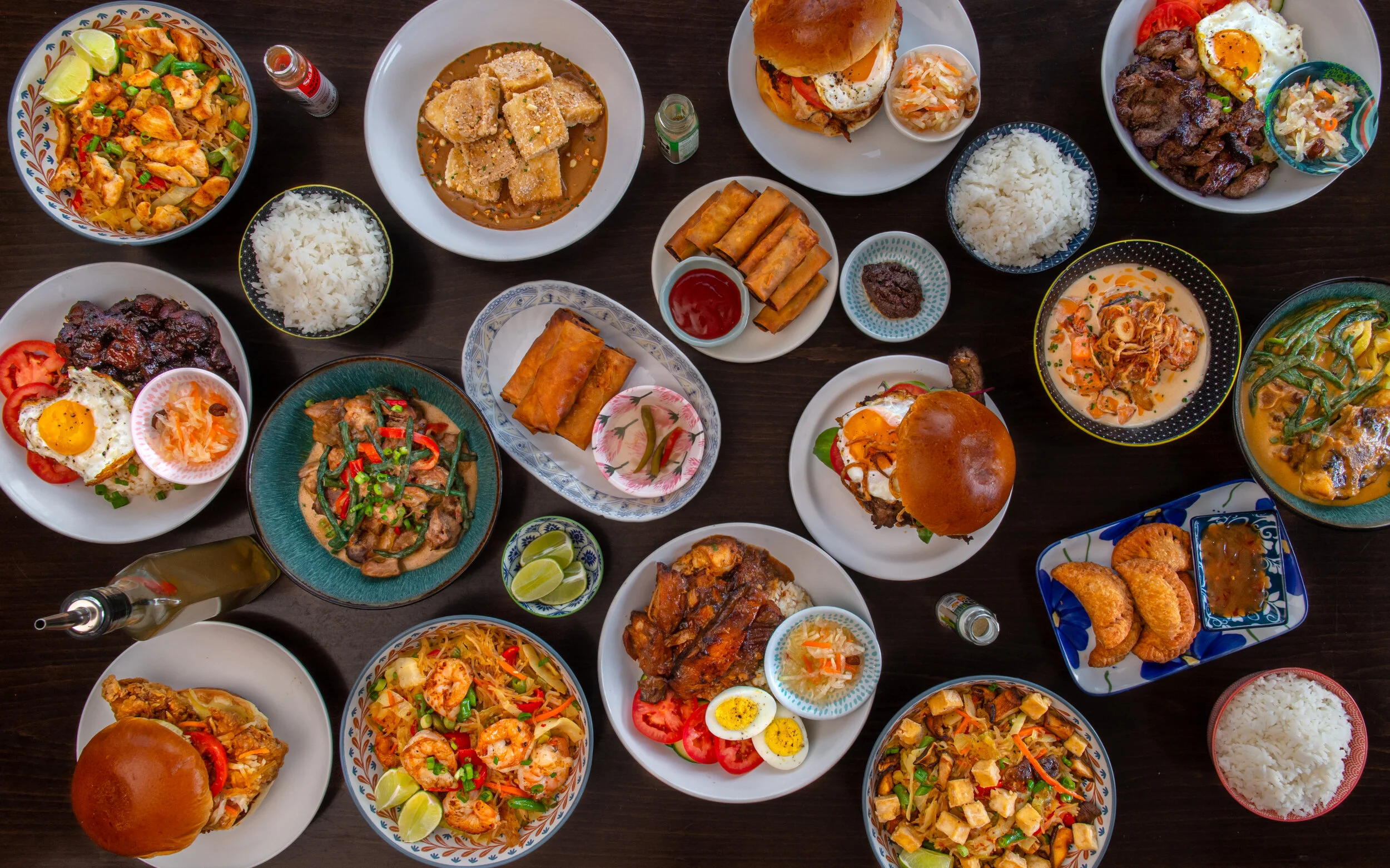 Filipino food spread with various dishes