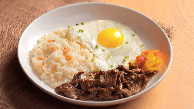 Classic Tapsilog — beef tapa, garlic rice, and egg